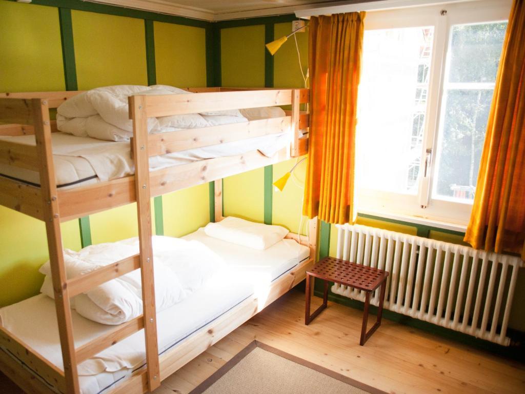 Nangijala Hostel Disentis Rum bild